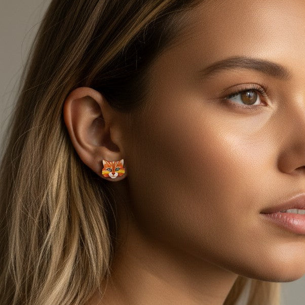 Woman wearing a black top with a neutral background