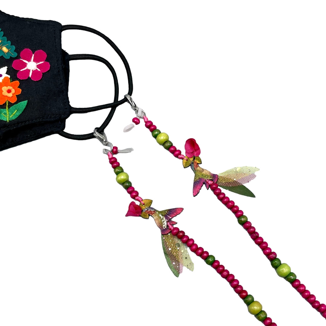 Pink Anna Hummingbird chain attached to face mask.  Chain can be used for eyeglasses or face masks.  Handmade in Colombia. 